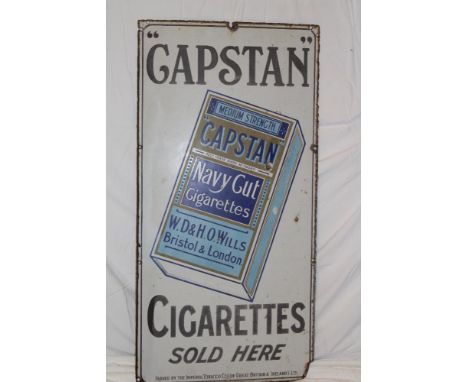 An old enamel rectangular advertising sign "Capstan Cigarettes Sold Here", 36" x 18"