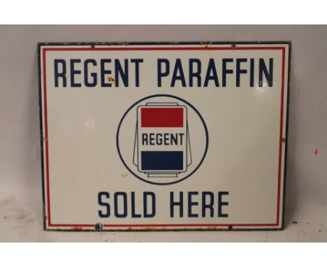 An enamel rectangular garage forecourt sign "Regent Paraffin Sold Here", 14" x 18"