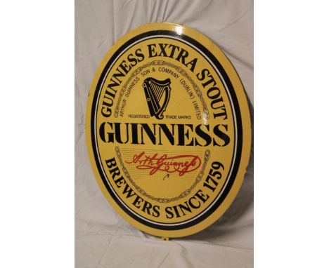 A modern enamel oval advertising sign "Guinness", 25" x 19"