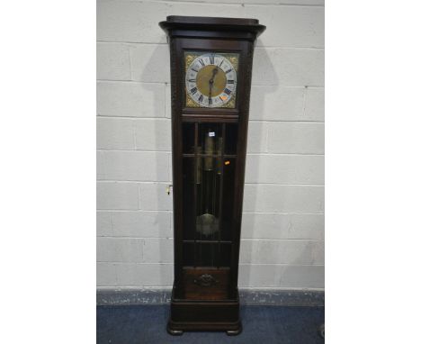 A 20TH CENTURY OAK CHIMING LONGCASE CLOCK, with a full length door, enclosing a brass and silvered dial, Whittington &amp; We