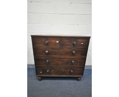 A GEORGIAN MAHOGANY CHEST OF TWO SHORT OVER THREE LONG GRADUATED DRAWERS, with turned handles, on cylindrical bobbin feet, wi