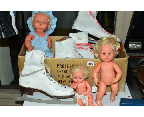 AN UNBOXED PALITOY TINY TOYS DOLL, with a smaller Palitoy vinyl baby doll and similar unmarked doll, with a pair of size 7  '