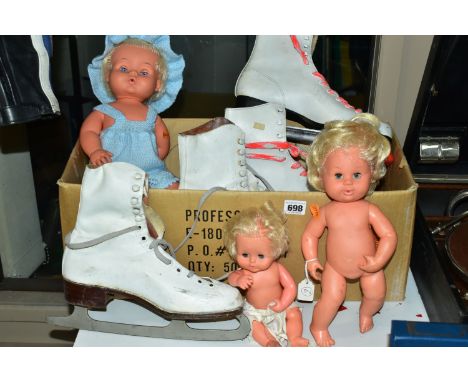 AN UNBOXED PALITOY TINY TOYS DOLL, with a smaller Palitoy vinyl baby doll and similar unmarked doll, with a pair of size 7  '