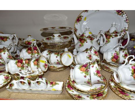 A ROYAL ALBERT 'OLD COUNTRY ROSES' PATTERN PART DINNER AND TEA SERVICE, comprising twelve teacups, twelve saucers, thirteen t