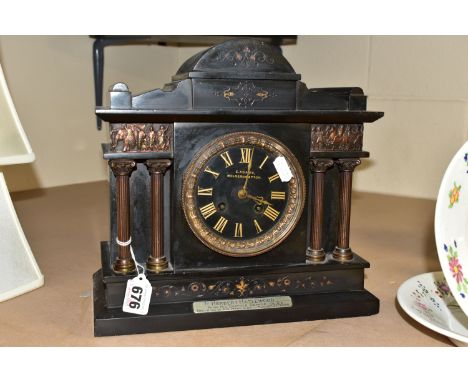 A LATE VICTORIAN BLACK SLATE AND MARBLE MANTEL CLOCK, the case of architectural form with gilt details, the black dial having