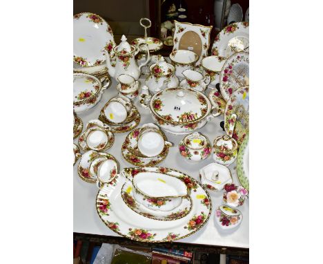 A QUANTITY OF ROYAL ALBERT 'OLD COUNTRY ROSES' PATTERN DINNER AND TEA WARE, comprising two lidded tureens, six tea cups (thre