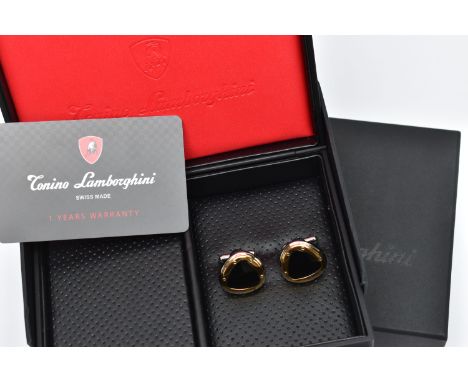 A PAIR OF 'TONINO LAMBORGHINI' CUFFLINKS, rounded triangle cufflinks detailing a polished white and yellow metal finish, inla