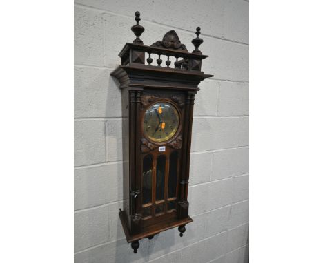 A 20TH CENTURY FRENCH WALNUT WALL CLOCK, with a brassed dial, height 106cm (condition - previous repairs, historical cracks a