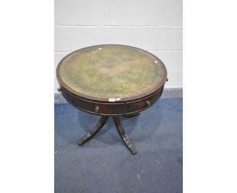 A REPRODUCTION MAHOGANY PEDESTAL DRUM TABLE, with a green leather and gilt tooled leather inlay top, four drawers and four du