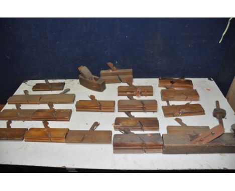 A COLLECTION OF VINTAGE PLANES to include ten wooden moulding planes, two wooden rebate planes, six wooden smoothing planes, 