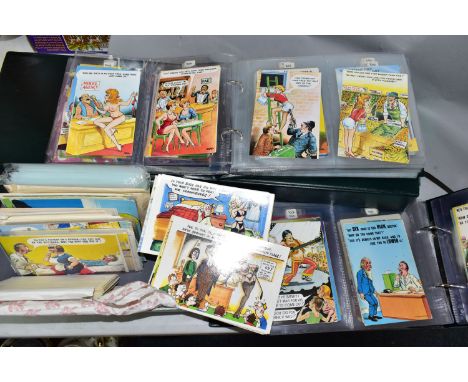 A LARGE COLLECTION OF VINTAGE POSTCARDS, comprising two  albums containing four hundred Bamforth cards of the 'Comic' series 
