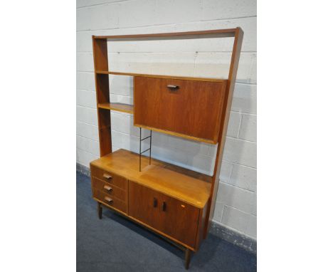 A G PLAN 1960's TEAK ROOM DIVIDER, with an arrangement of shelves, and fall front door, over a base with three drawers and do