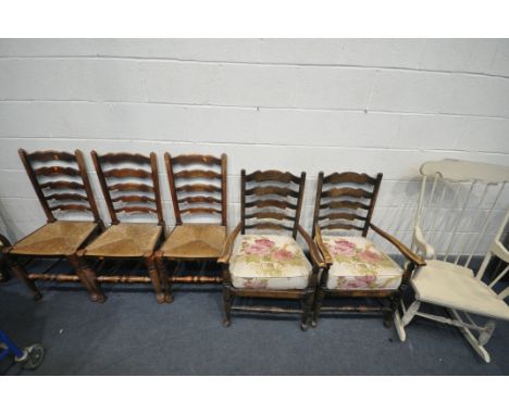 A PAIR OF REPRODUCTION OAK LADDER BACK OPEN ARMCHAIRS, three Lancashire oak ladder back chairs, and a white painted rocking c