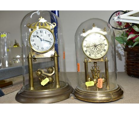 TWO GLASS DOMED CLOCKS, comprising a  West German 400 day anniversary clock 'Kieninger &amp; Obergfell' Kundo,  brass faced w