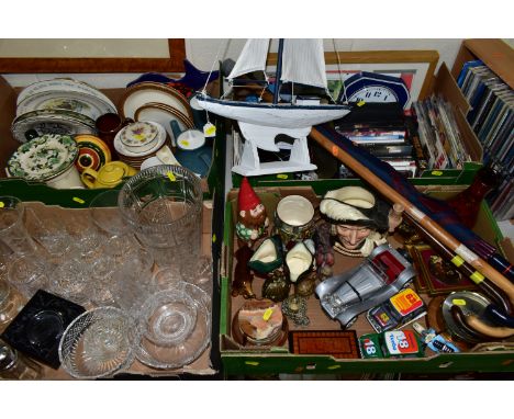 FOUR BOXES OF ASSORTED GLASS, CERAMICS, CDs, DVDs, to include a quantity of drinking glasses, a Poole pottery 'Blue Moon' mil