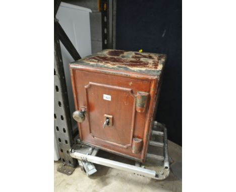 A SMALL VINTAGE CAST IRON SAFE, with key, width 36cm x depth 37cm x height 44cm (condition:-paint partially worn, key and loc
