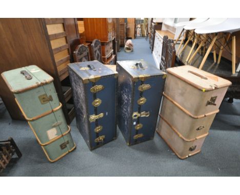 TWO VINTAGE BLUE FINISH TRAVELLING TRUNKS, and two canvas and beech banded trunks (condition:-all with scratches) (4)