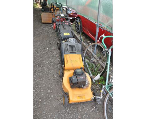 A McCULLOCH 38465 PETROL LAWN MOWER with Briggs and Stratton Sprint 40 engine (engine pulls freely but hasn't been started)