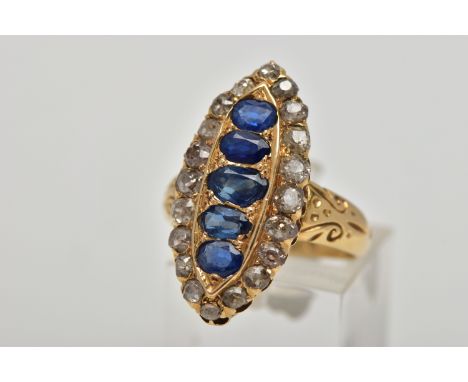 AN 18CT GOLD, LATE VICTORIAN SAPPHIRE AND DIAMOND RING, of a large marquise form set centrally with a row of five oval cut bl