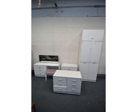 A WHITE BEDROOM SUITE, comprising a double door wardrobe with a top compartment, width 76cm x depth 52cm x height with top bo