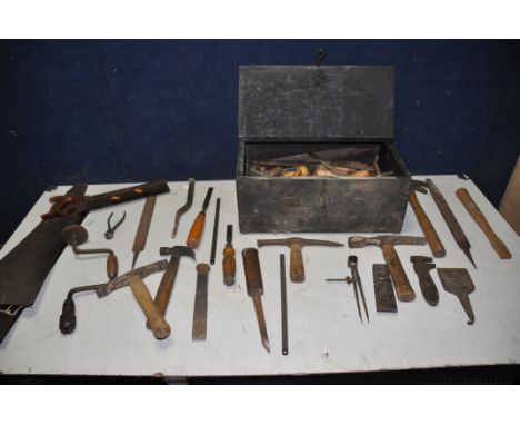 A BESPOKE WOODEN TOOLBOX containing hammers, chisels, files, drill bits, marking tools etc.