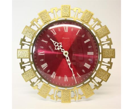 A 1960's wall clock; with a Timemaster battery movement.  28 cm diameter.