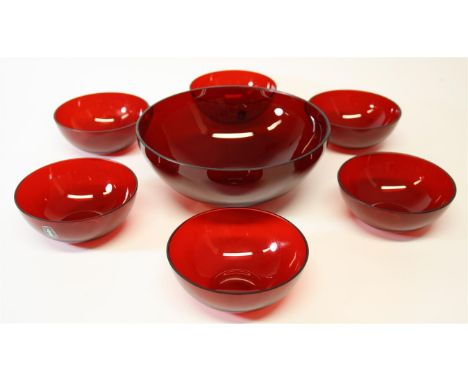 A Whitefriars 9590 ruby red fruit set:  comprising of one fruit serving bowl and six fruit/dessert bowls.