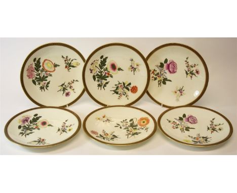 Twelve Royal Worcester porcelain dessert plates.  All with individual hand-painted floral decoration. Border detail, with gil