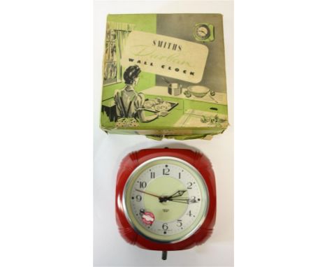 A 1950's Smiths Durban wall clock, boxed and unused, with paperwork.