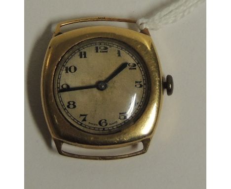 A gents 18ct gold cased,manual wind wristwatch of cushion shape.  The circular dial with black Arabic numerals.