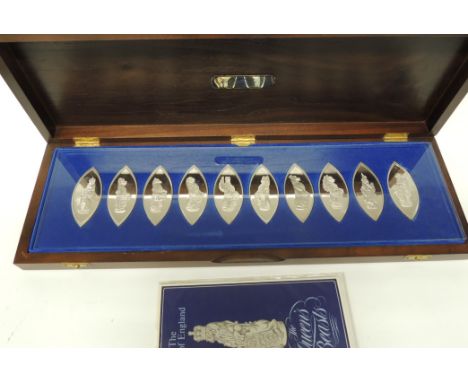 A complete, cased silver ingot set, "The Queen's Beasts", ten medallions, each 1.7 oz approx (total 17 oz approx) with descri