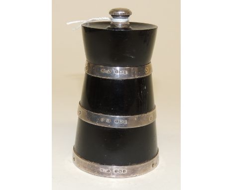 An Ebony and silver banded peppercorn grinder.  The three silver bands hallmarked for Birmingham 1926, the base marked "PEUGE