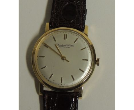 A Gents 18k gold, "INTERNATIONAL WATCH CO", wristwatch, manual wind, the silvered dial with gold baton numerals.  Sweep secon