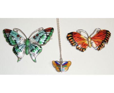 A large silver and enamel, multi coloured butterfly brooch by "JOHN ATKINS AND SONS", enamelled in red/green/pale blue/black 