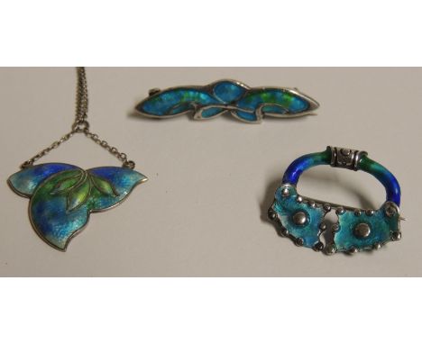 A "Sterling Silver" enamelled leaf form pendant, with blue/green enamel (small chip and hairline crack to enamel), a silver m