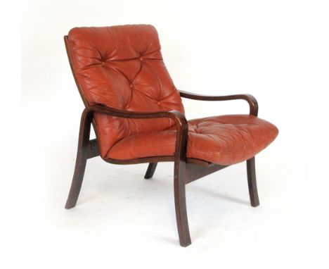 A 1970's bentwood armchair with pale brown button upholstery and Fagas webbing