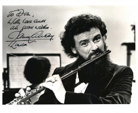 James Galway, OBE signed 10x8 inch black & white photo. Is an Irish virtuoso flute player from Belfast, nicknamed "The Man wi