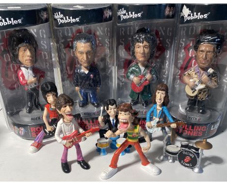 ROLLING STONES BOBBLE DOBBLES. A complete set of four 2002 boxed Rolling Stones bobbleheads from Bobble Dobbles. Also to incl