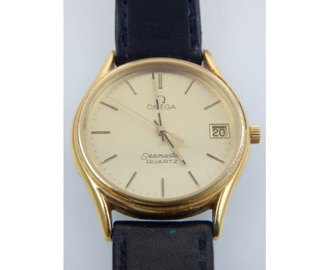 A boxed gentleman's gold plated Omega Seamaster 1337 quartz wristwatch, circa 1980, the champagne dial with baton markers, da