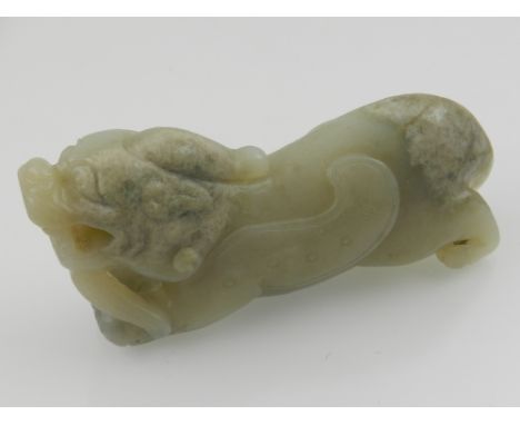 A Chinese jade figure of a kylin. H. 5.5cm 