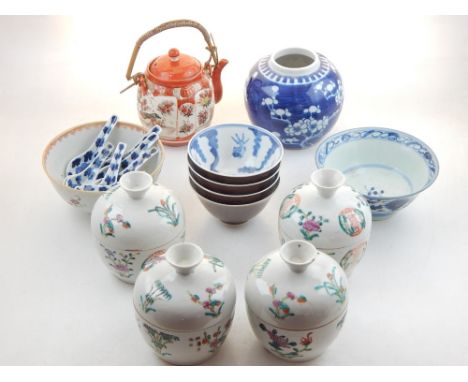 A collection of assorted Chinese ceramics to include a famille rose bowl, four lidded porcelain bowls, Kutani teapot and cove