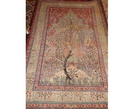 A late 19th century Persian carpet, of foliate design, floral borders, 154x213cm