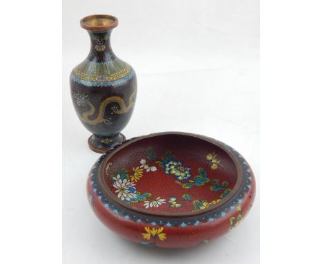 A Chinese cloisonne baluster shaped vase, decorated with dragons chasing a flaming pearl on a black ground, H. 19cm, together
