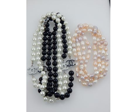 A Chanel style pearl necklace, together with another pearl necklace.