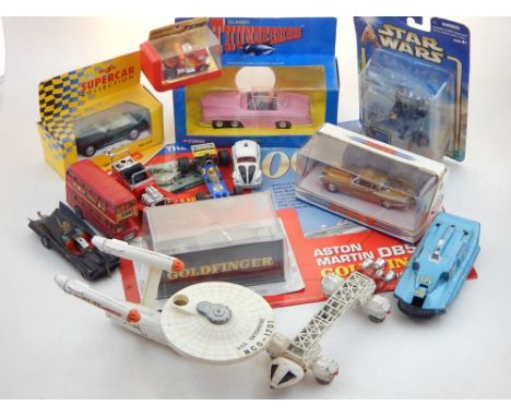 A quantity of die cast model vehicles, some boxed including a collectors edition 007 Aston Martin DB5, Corgi Tunderbirds FAB1