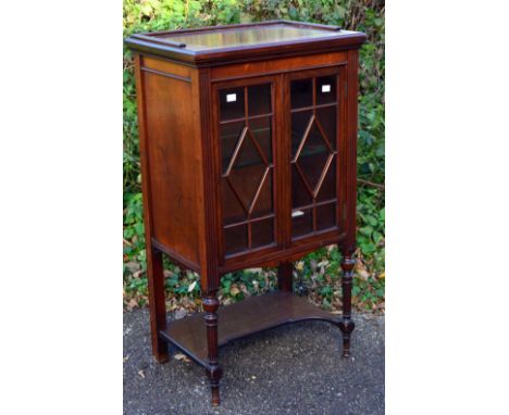 Edwardian mahogany and glazed two door cupboard with glass shelf and under tier 95cm high