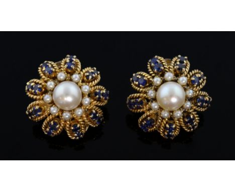 Gold, sapphire and pearl cluster clip on earrings, an 8.2 mm  pearl to the centre with a pearl cluster surround and a further