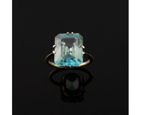 Art Deco ring set with blue zircon, the emerald cut ring of 16 carats in unmarked white metal 