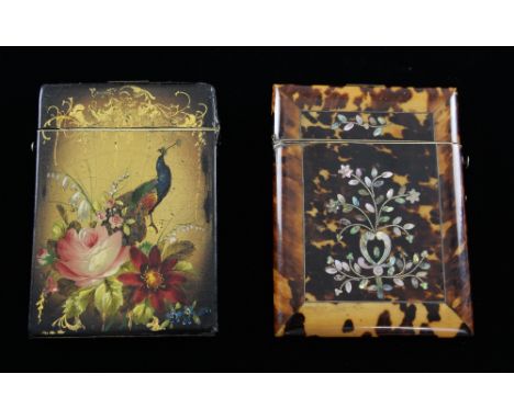 Tortoiseshell card case inlaid with mother of pearl floral sprigs,  and another in papier-mƒch‚, hand painted with a peacock 