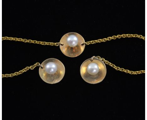  Pearl shirt studs, late 19th century, set of three gold (unmarked) and pearl shirt studs, linked by chain, in original A E S
